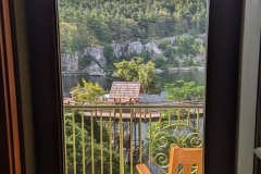 View out the screen door of lake view room